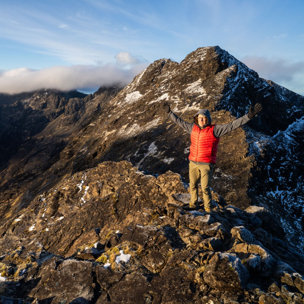 Men's Solo Gilet worn outdoors - PrimaLoft insulated vest for hiking and layering