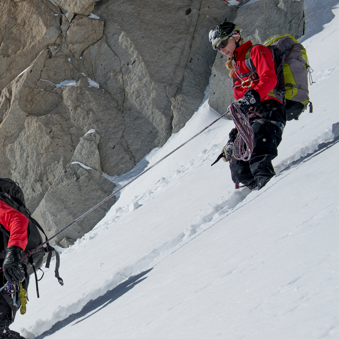 Women's Iona waterproof trousers action shot in deep snow
