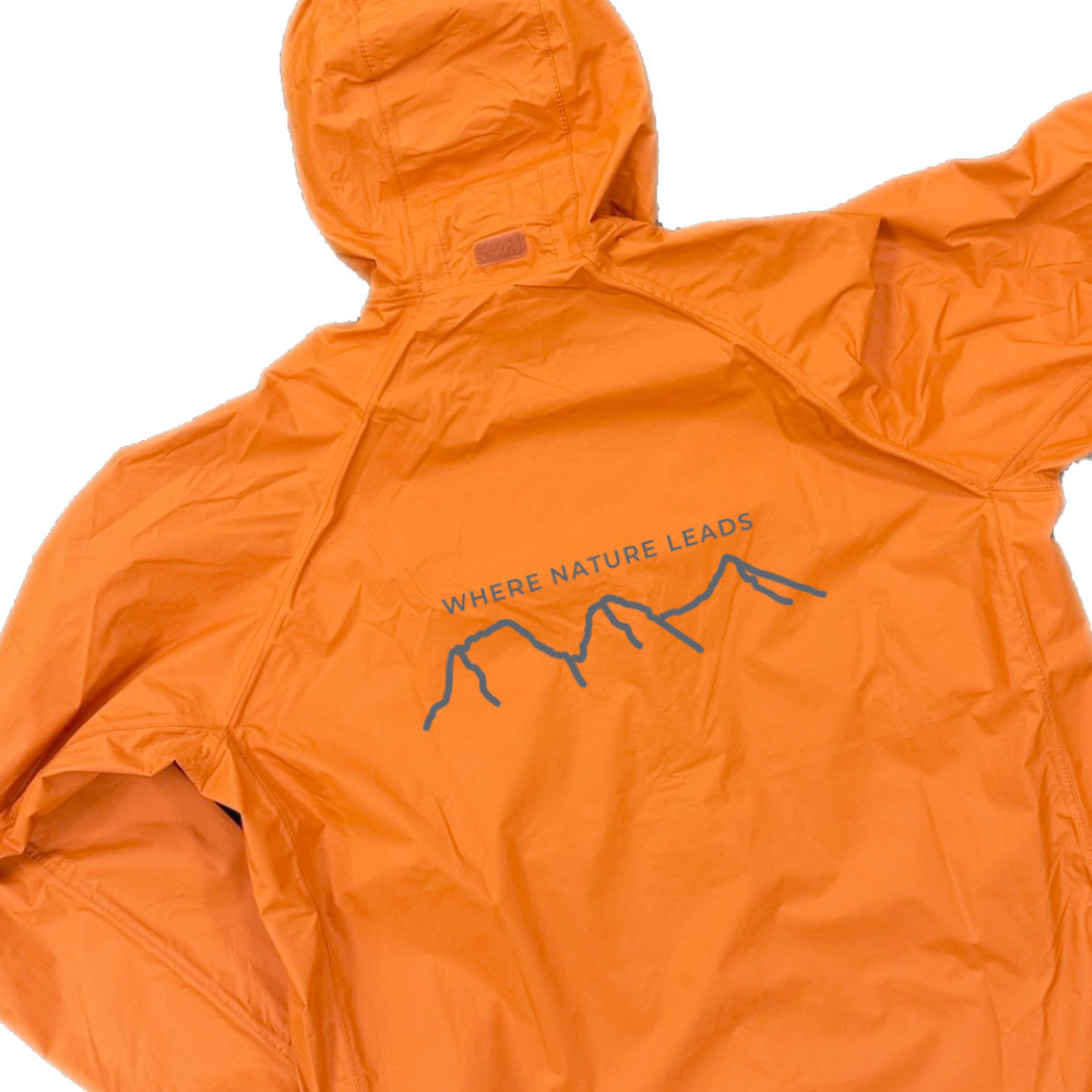 Where Nature Leads packaway jacket back view showing Three Sisters of Glencoe graphic design